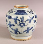 AN 18TH / 19TH CENTURY CHINESE BLUE & WHITE PORCELAIN VASE - decorated with stylized flora. 15cm