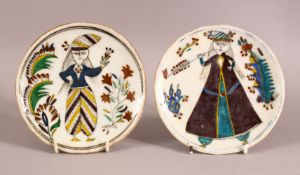 2 TURKISH KUTAHYA POTTERY PLATES - EACH DEPICTING A FIGURE - 14CM