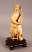 A 19TH / 20TH CENTURY CHINESE CARVED IVORY SEATED MUSICIANS, the female figure in a seated