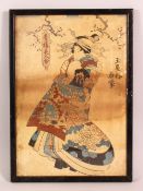 A JAPANESE PRINT depicting a robed figure, framed and glazed, 37cm x 26cm.