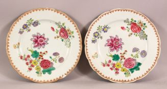 TWO 18TH /19TH CENTURY CHINESE FAMILLE ROSE PORCELAIN PLATES - each decorated with native floral