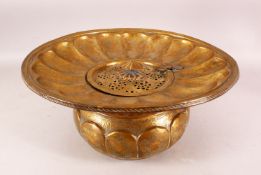 A LARGE 18TH/19TH CENTURY PERSIAN BRASS BASIN, with hinged lid, 37cm diameter.