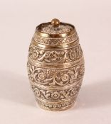 A FINE 19TH CENTURY INDIAN CUTCH SILVER PEPPERETTE, by Oomersi Mawji, with embossed foliate