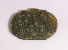 A PERSIAN QAJAR CARVED JADE PENDANT - carved with seated figures 8cm x 5cm