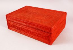 A 19TH / 20TH CENTURY INDIAN RED LACQUER & WOOD CARVED BOX, carved with figures and motif, 35cm x
