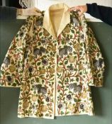 AN ATTRACTIVE EMBROIDERED KASHMIR LONG JACKET, 20th Century, embroidered with stylised cockerels