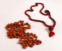 TWO CARVED TIBETAN SEED / NUT ROSARY BEAD NECKLACES, The larger approx 140cm open, the smaller