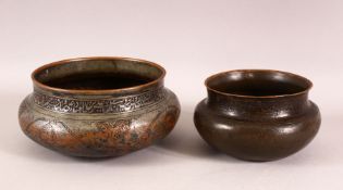 TWO 17TH CENTURY PERSIAN SAFAVID TINNED COPPER BOWLS, 21cm diameter and 15cm diameter.