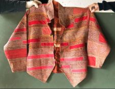 AN EMBROIDERED ETHNIC JACKET, 20th Century, silk lined, made up with earlier embroidered textiles,