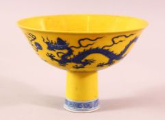 A CHINESE MING STYLE BLUE & WHITE PORCELAIN STEM BOWL - with a yellow ground and decorated with