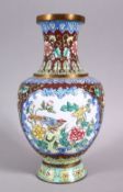 A GOOD 20TH CENTURY CHINESE ENAMEL VASE - ith a cafe au lait ground and panels of birds amongst