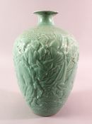 A CHINESE CELADON MOULDED LANTERN SHAPED PORCELAIN VASE - with moulded decoration of immortal