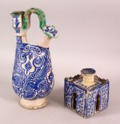 A 19TH CENTURY NORTH AFRICAN MOROCCAN POTTERY EWER, together with a similarly decorated inkwell,