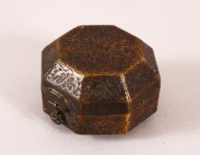 A FINE PERSIAN BRASS HEXAGONAL SHAPED BOX with hinged cover and engraved decoration, 5cm wide.