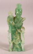 A CHINESE CARVED GREEN ROCK / JADE FIGURE OF A FEMALE FIGURE AND FLORA 24CM