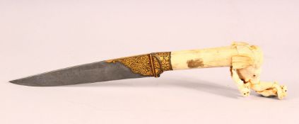 A GOOD INDIAN CARVED BONE & INLAID WATERED STEEL DAGGER, the hilt formed as an elephant from