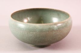 A CHINESE SONG STYLE RU WARE BOWL, celadon ground with a crackle glaze, two character mark to the