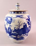 A CHINESE KANGXI STYLE BLUE & WHITE PORCELAIN JAR & COVER - decorated with Immortals in landscapes