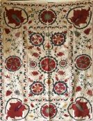AN EMBROIDERED COTTON WALL HANGING / BEDSPREAD, 20th Century, Susani, 4ft 3ins x 3ft 4ins.