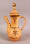 A TURKISH TOPHANE POTTERY COFFEE POT - with carved motif decoration highlighted in gilt - 30cm high