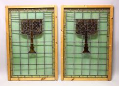 A PAIR OF JEWISH THEME STAIN GLASS WINDOWS - each with a central stained glass centre depicting a