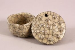 AN UNUSUAL CHINESE GE WARE LOTUS SHAPED BRUSH WASHER, 17cm long.