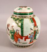 A 19TH CENTURY FAMILLE VERTE PORCELAIN JAR & COVER - Decorated with scenes of figures interior -