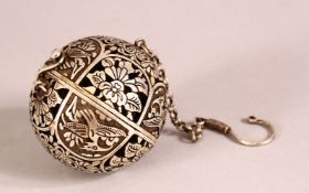 A CHINESE SILVER OPENWORK INCENSE BURNER BALL - Opening to reveal a holder for incense, carved