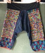 CHINESE MINORITY PEOPLE'S, a pair of Ethnic trousers, cotton ground with heavy geometric embroidered