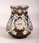 AN ISLAMIC AMBER GLASS VASE with enamel decoration, 12cm high.
