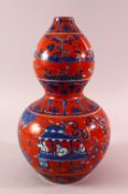 A MING STYLE CORAL RED DOUBLE GOUD PORCELAIN VASE - with blue & white decoration of figures and