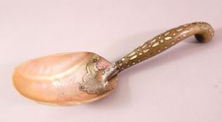 A SOUTH EAST ASIAN SILVER MOUNTED HORN AND MOTHER OF PEARL CEREMONIAL LADLE, 28cm long.