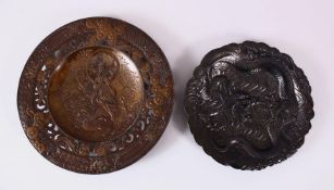 TWO JAPANESE MEIJI PERIOD SOFT METAL / ANTIMONY DISHES - KWANNON - DRAGON, the larger in fine detail