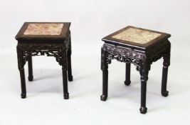 A PAIR OF CHINESE SQUARE FORM MARBLE INSET HARDWOOD STANDS, the frieze carved with bands of floral