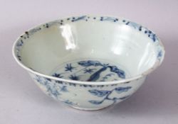 A CHINESE MING BLUE & WHITE PORCELAIN BOWL,decorated with scenes of stylized native flora, 16cm