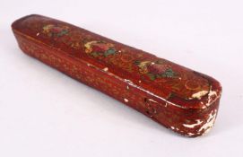 A 19TH CENTURY PRESIAN QAJAR LACQUER QALAMDAN PEN BOX, decorated upon a red ground with floral