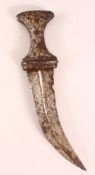 AN ARABIAN JAMBIYA / DAGGER, with silver and gold inlaid hilt, (badly worn), 28cm long.