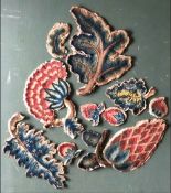 AN INTERESTING COLLECTION OF TEXTILE FRAGMENTS mostly European, to include crewelwork slips, circa