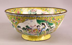 A GOOD CHINESE CANTON ENAMEL BOWL, decorated with panels of birds and flora with a yellow