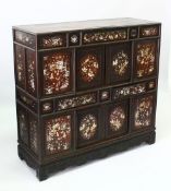 A 19TH/20TH CENTURY CHINESE MOTHER OF PEARL INLAID HARDWOOD CABINET, each end with six floral inlaid