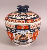 A 20TH CENTURY JAPANESE IMARI PORCELAIN BOWL & COVER - 17cm high.