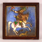 A 19TH CENTURY PERSIAN PORCELAIN TILE PANEL - depicting a figure upon horseback - framed 29cm