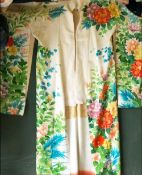 A GOOD HEAVY SILK KIMONO with colourful tropical floral decoration, approx 5ft 4in long.