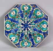 A 19TH CENTURY TURKISH OTTOMAN KUTAHIYA POTTERY TILE, 22cm square.