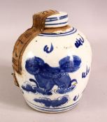 A CHINESE BLUE & WHITE PORCELAIN GINGER JAR - sealed with its original sealed content and, decorated