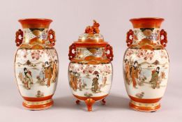 A GARNITURE OF JAPANESE KUTANI VASES, the central vase formed as a koro and cover, flanked by a pair