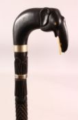 A GOOD CEYLONESE CARVED EBONY ELEPHANT HANDLE WALKING STICK - carved handle in the form of an