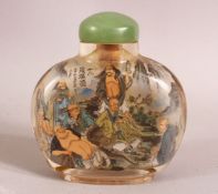 A CHINESE REVERSE PAINTED SNUFF BOTTLE - painted with immortal figures in landscapes and signed -