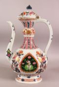 A CHINESE FAMILLE ROSE PORCELAIN EWER, with a panel to each side depicting a young boy seated on a