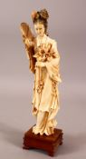 A 19TH / 20TH CENTURY CHINESE CARVED IVORY FIGURE OF GUANYIN GODDESS, the female figure in a stood